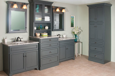 Example of a mid-sized transitional master ceramic tile and beige floor bathroom design in New York with beaded inset cabinets, gray cabinets, a two-piece toilet, green walls, an undermount sink and granite countertops