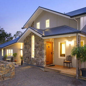 Traditional Exteriors Featuring Stone