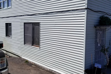 Example of an exterior home design in Other