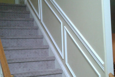 Inspiration for a mid-sized timeless carpeted straight wood railing staircase remodel in Philadelphia with carpeted risers