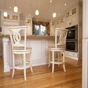 Elegant Kitchen Remodel - The raised island provides additional seating.