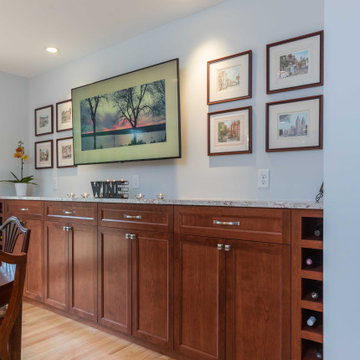Modern Kitchen with White Flat Panel Shaker Cabinets & Natural Stone Backsplash