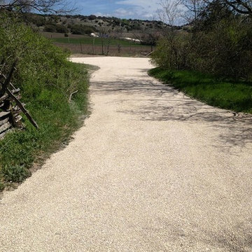 Tar and chip seal installation in Hutto, Texas