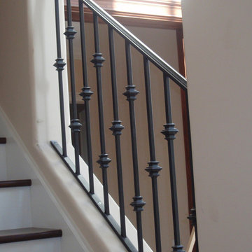 Ornamental iron stem all stair rail with baluster collars