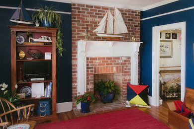 Beach style living room photo in Other