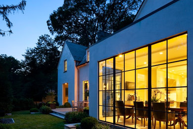 Inspiration for a transitional white gable roof remodel in New York