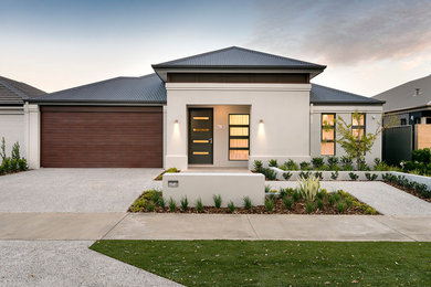 Photo of a large contemporary one-storey beige exterior in Perth.