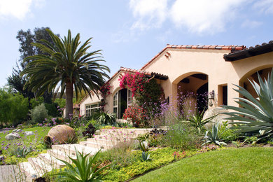 This is an example of a mediterranean full sun front yard landscaping in San Diego.