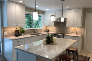Example of a mid-sized trendy kitchen design in Seattle