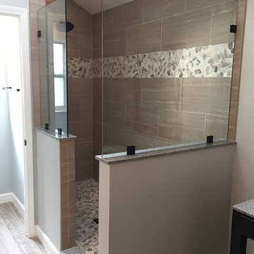 Master bath gardern tub and standing shower converted to large walk in shower