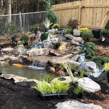 Backyard water feature, how to use the lay of the land to your advantage!