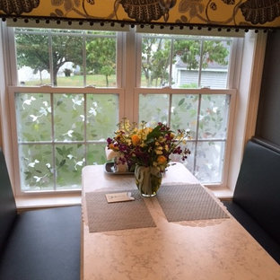 Small traditional kitchen pantry remodeling - Small elegant galley ceramic floor kitchen pantry photo in Manchester with an undermount sink, raised-panel cabinets, yellow cabinets, quartz countertops and white appliances