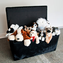 Black Cowhide Storage Ottoman - Footstools And Ottomans