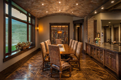 Inspiration for a large rustic medium tone wood floor kitchen/dining room combo remodel in Other with beige walls and no fireplace