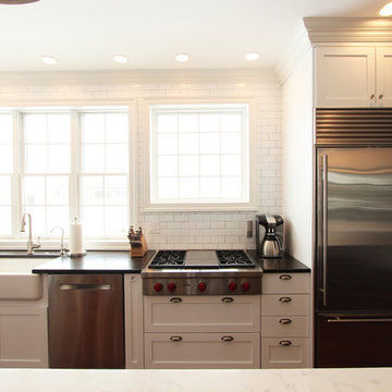 Multiple Height Kitchen Windows Behind Sink and Range Top