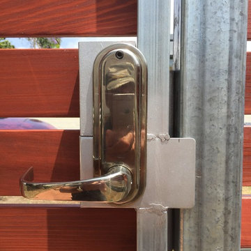 metal and wood fencing and gates