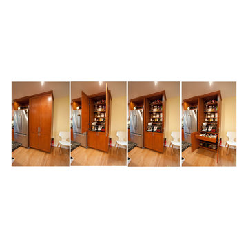 Pantry with pocket doors, quartz counter and plugs so appliances stay inside