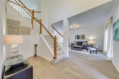 Inspiration for a mid-sized transitional vinyl floor and beige floor living room remodel in Austin