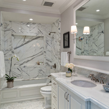 White Calcutta Gold Marble Guest Bath