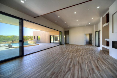 Home design - large contemporary home design idea in Phoenix