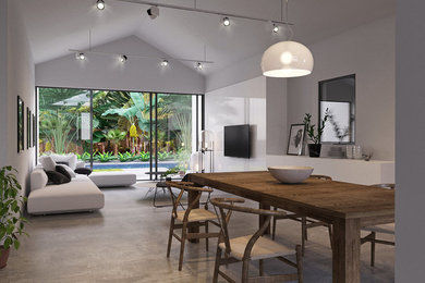 Example of a mid-sized trendy formal and open concept concrete floor and gray floor living room design in Miami with white walls, no fireplace and a wall-mounted tv
