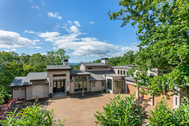 Inspiration for a huge contemporary house exterior remodel in Other