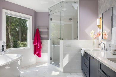 Mid-sized transitional master multicolored tile and cement tile ceramic tile, white floor, double-sink and vaulted ceiling bathroom photo in Other with recessed-panel cabinets, blue cabinets, a bidet, purple walls, an undermount sink, quartz countertops, a hinged shower door, white countertops and a built-in vanity