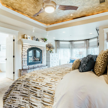 After - white washing the fireplace stone, changing the window treatments and ac
