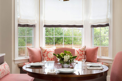 Small elegant medium tone wood floor dining room photo in DC Metro with beige walls and no fireplace