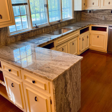 Fantasy Brown - Quartzite. Kitchen countertops with Complete Height Backsplashes
