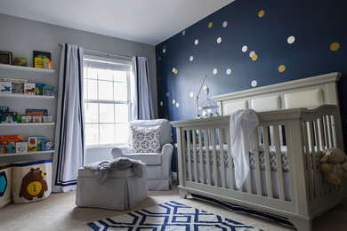 Nursery - mid-sized transitional boy nursery idea in Charleston with blue walls