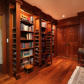 Library with sliding hidden compartments