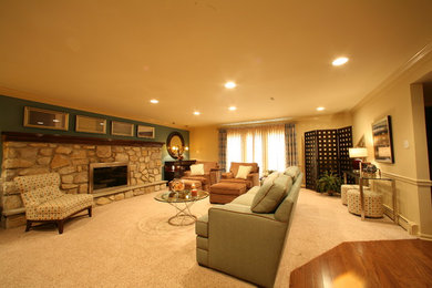 Transitional carpeted family room photo in Philadelphia with beige walls, a standard fireplace and a stone fireplace