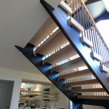 96_Dramatic cantilevered no-riser staircase, Bethesda, MD 20814
