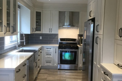 Example of a trendy kitchen design in Toronto