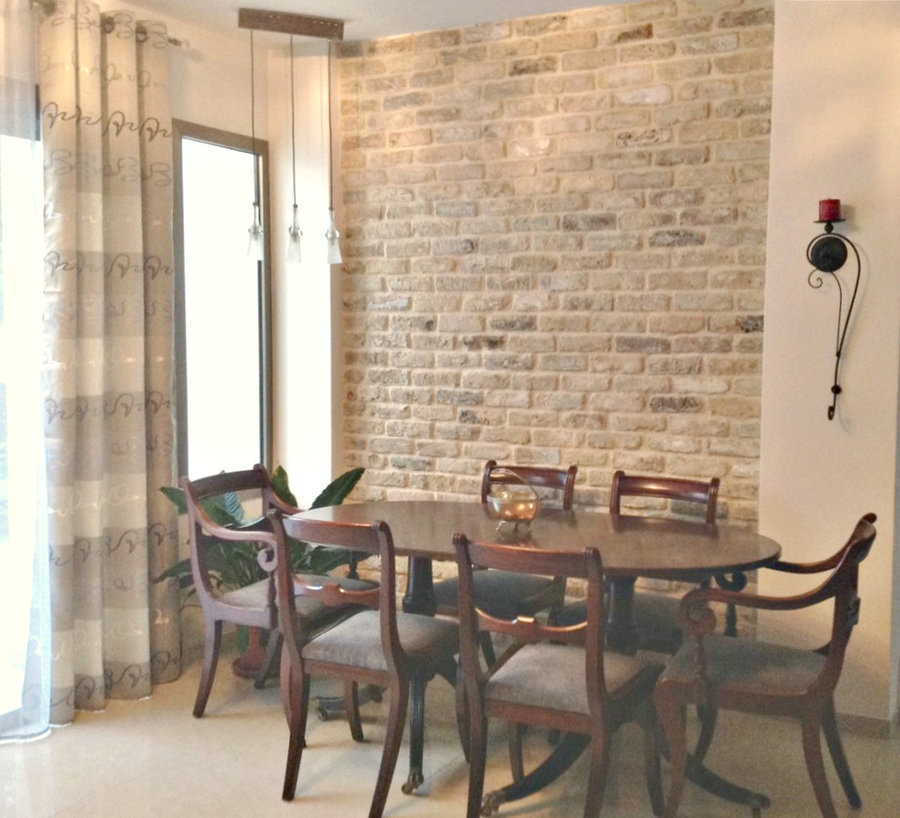 brick wall, glass corner lamp and antique dining set