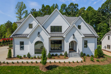 Inspiration for a french country exterior home remodel in Charlotte