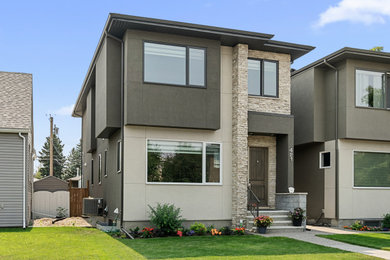 Inspiration for a transitional exterior home remodel in Calgary
