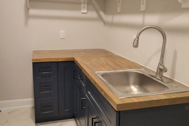 Laundry room - laundry room idea in Raleigh