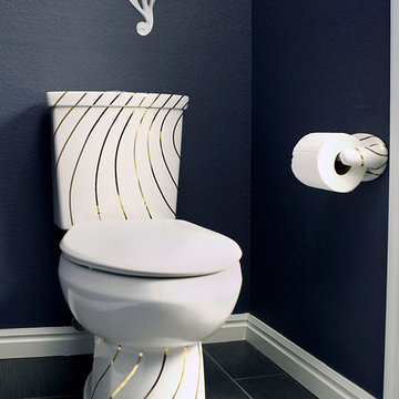 Gold Swirling Lines Toilet in Navy Bathroom