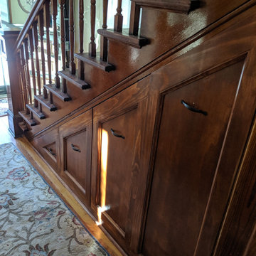 Entry hall closet built under stairs