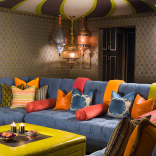 Example of an asian enclosed home theater design in San Diego with multicolored walls