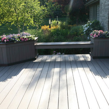 Azek deck with lighting, flower boxes, and benches