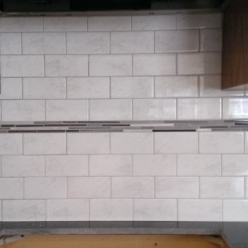 KITCHEN - Backsplash - 3" x 6" Ceramic Carrera Marb w/ Linear Glass Accent Band