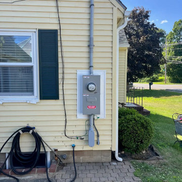 A new outdoor meter and main disconnect, installed straight and weather-tight