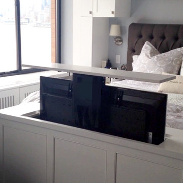 Nexus 21 Automated TV Lift in a Master Bedroom