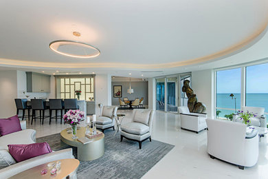 Inspiration for a large modern open concept living room remodel in Miami with white walls
