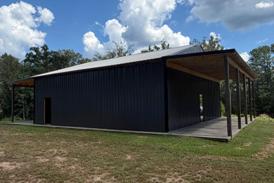 Large country two-car carport photo in Other
