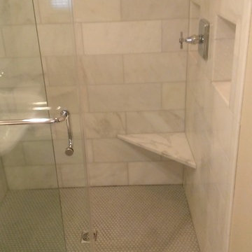 BATHROOM - Calcutta Gold Marble Shower / Gray Penny Tile Floor