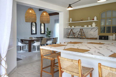 Design ideas for a large world-inspired open plan kitchen in Montpellier with an island.